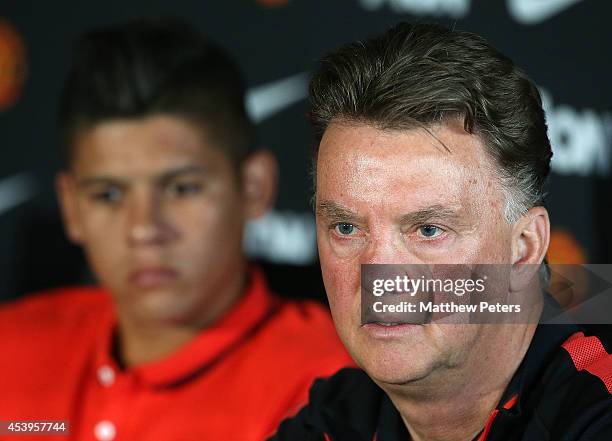 Manager Louis van Gaal of Manchester United speaks during a press conference to unveil new signing Marcos Rojo at Aon Training Complex on August 22,...