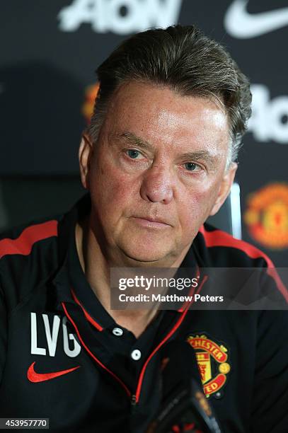 Manager Louis van Gaal of Manchester United speaks during a press conference to unveil new signing Marcos Rojo at Aon Training Complex on August 22,...