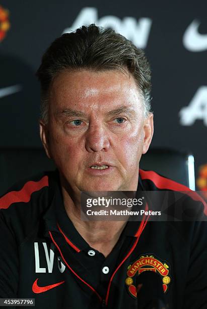 Manager Louis van Gaal of Manchester United speaks during a press conference to unveil new signing Marcos Rojo at Aon Training Complex on August 22,...