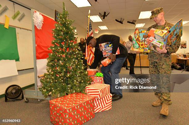 Shaquille O'Neal visits Humphries Elementary School as part of the Marines Toys for Tots program on December 5, 2013 in Atlanta, Georgia.