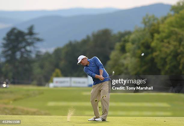 Yevgeny Kafelnikov of Russia plays his second shot on the 5th fairway during day two of D+D REAL Czech Masters at Albatross Golf Resort on August 22,...