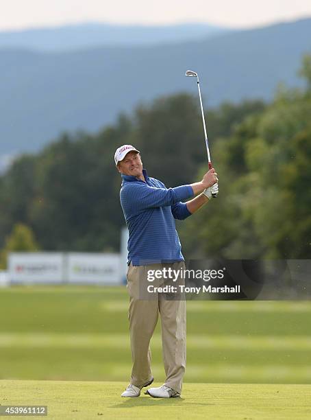 Yevgeny Kafelnikov of Russia plays his second shot on the 5th fairway during day two of D+D REAL Czech Masters at Albatross Golf Resort on August 22,...