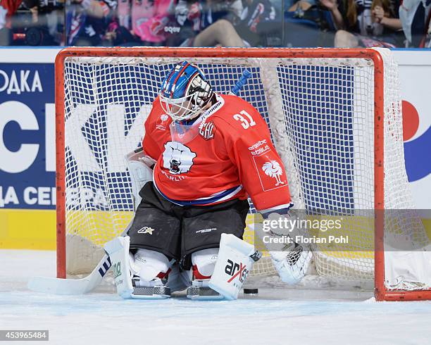 Petri Vehanen of Eisbären Berlin is disappointed after a goal during the Champions Hockey League group stage game between Eisbaeren Berlin and HC...