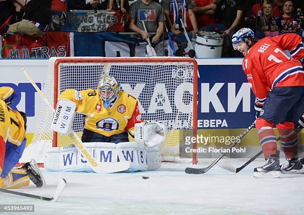 Mark Bell of Eisbären Berlin scores their first goal past Goalie Lubos Horcicka of PSG Zlin during the Champions Hockey League group stage game...