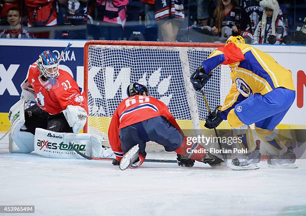 Petr Leska of PSG Zlin scores their first goal past Goalie Petri Vehanen of Eisbären Berlin during the Champions Hockey League group stage game...