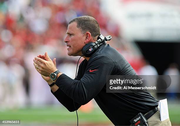 Coach Greg Schiano of the Tampa Bay Buccaneers directs play against the Atlanta Falcons November 17, 2013 at Raymond James Stadium in Tampa, Florida....