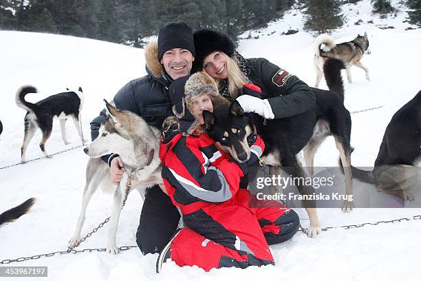 Gedeon Burkhard, Gioia Filomena Burkhard and Anika Bormann attend the Sledge Dog Race Training - Tirol Cross Mountain 2013 on December 06, 2013 in...