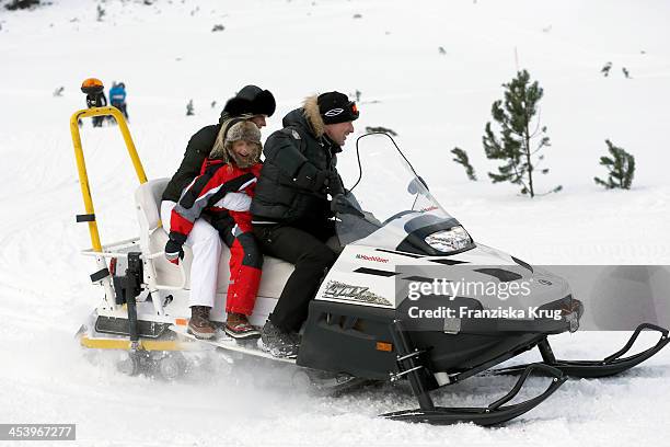 Anika Bormann, Gioia Filomena Burkhard and Gedeon Burkhard attend the Sledge Dog Race Training - Tirol Cross Mountain 2013 on December 06, 2013 in...