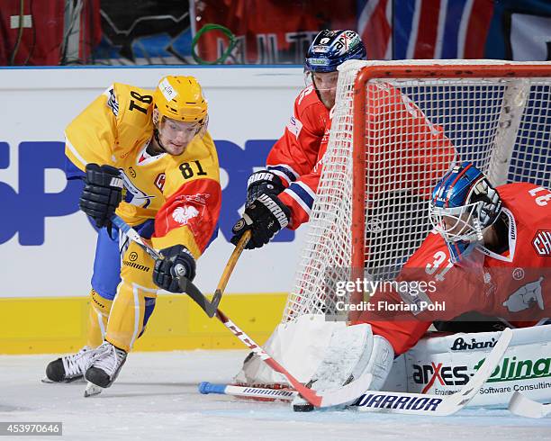 Petri Vehanen of Eisbären Berlin makes a saves on a shoot attempt by Petr Holik - PSG Zlin during the Champions Hockey League group stage game...