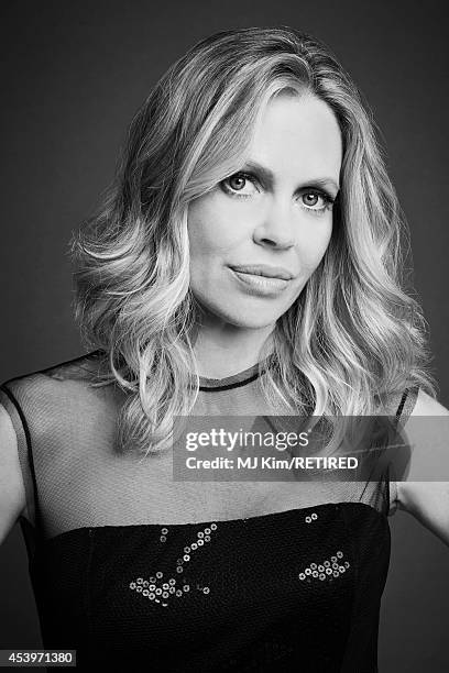 Kristin Bauer poses for a portrait at the Getty Images Portrait Studio powered by Samsung Galaxy at Comic-Con International 2014 on July 24, 2014 in...