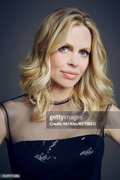 Kristin Bauer poses for a portrait at the Getty Images Portrait Studio powered by Samsung Galaxy at Comic-Con International 2014 on July 24, 2014 in...