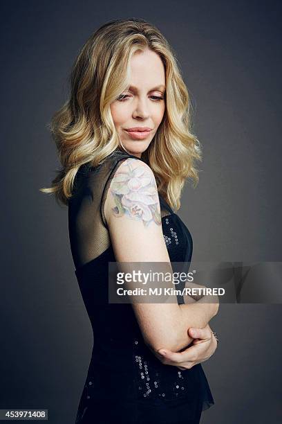 Kristin Bauer poses for a portrait at the Getty Images Portrait Studio powered by Samsung Galaxy at Comic-Con International 2014 on July 24, 2014 in...
