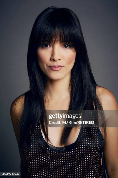 Kelly Hu poses for a portrait at the Getty Images Portrait Studio powered by Samsung Galaxy at Comic-Con International 2014 on July 24, 2014 in San...