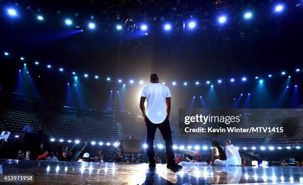 Singer Usher rehearses onstage during the 2014 MTV Video Music Awards at The Forum on August 22, 2014 in Inglewood, California.