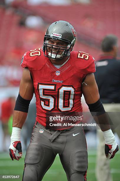 Defensive end Daniel Te'o-Nesheim of the Tampa Bay Buccaneers warms up for play against the Atlanta Falcons November 17, 2013 at Raymond James...