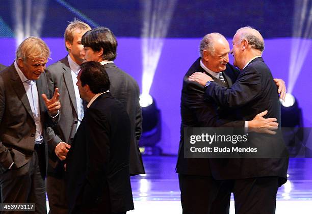 Spain coach Vicente del Bosque greets Brazil coach Luiz Felipe Scolari on stage after the Final Draw for the 2014 FIFA World Cup Brazil at Costa do...