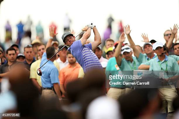 Rory McIlroy of Northern Ireland plays his shot from the 13th tee during the second round of The Barclays at The Ridgewood Country Club on August 22,...