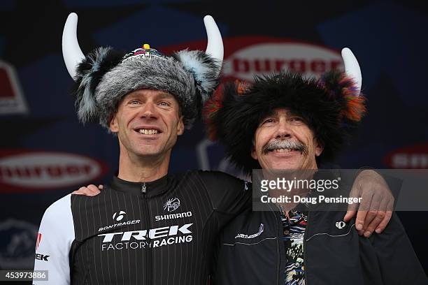Jens Voigt of Germany riding for Trek Factory Racing is given an Ullr Helmet as a retirement gift by the Mayor John Warner of Breckenridge following...