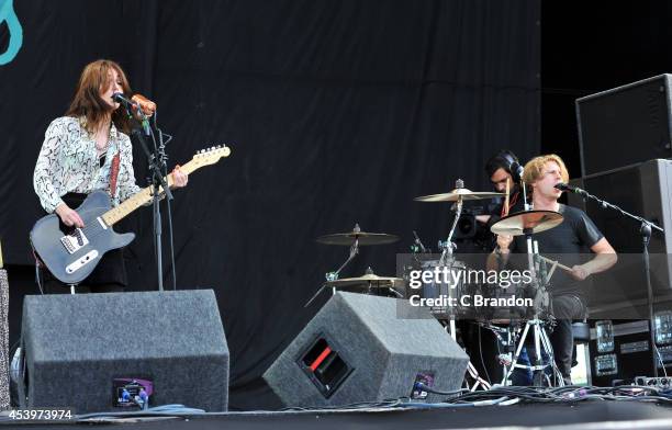 Laura-Mary Carter and Steven Ansell of Blood Red Shoes perform on stage at the Reading Festival at Richfield Avenue on August 22, 2014 in Reading,...