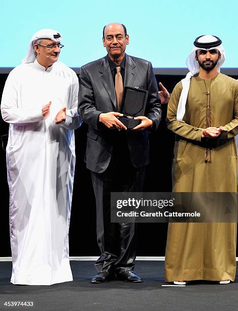 Ahmed Boleir with his award presented by HH Sheikh Mansoor bin Mohammed bin Rashid Al Maktoum and Artistic Director of DIFF Masoud Amralla Al Ali on...