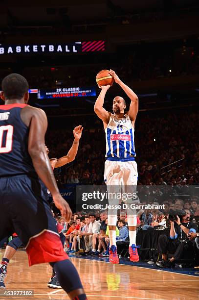 Ricardo Sanchez of the Puerto Rico National Team shoots against the USA Basketball Men's National Team on August 22, 2014 at Madison Square Garden in...