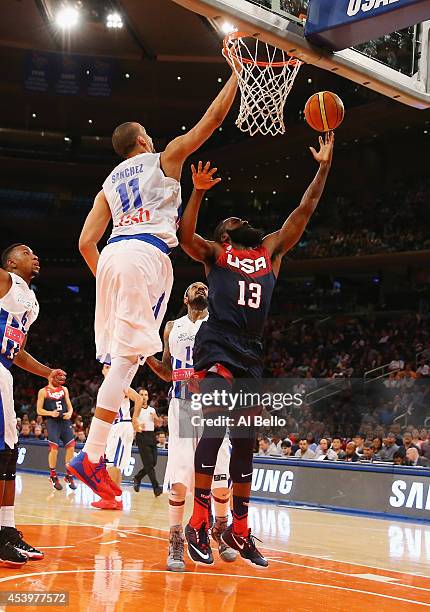 James Harden of the USA shoots against Ricardo Sanchez of Puerto Rico during their game at Madison Square Garden on August 22, 2014 in New York City.