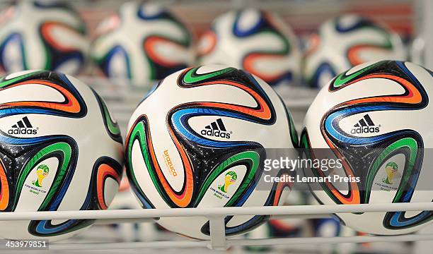Brazuca match balls for the FIFA World Cup 2014 lie in a rack on December 6, 2013 in Scheinfeld near Herzogenaurach, Germany. Brazuca is the Official...