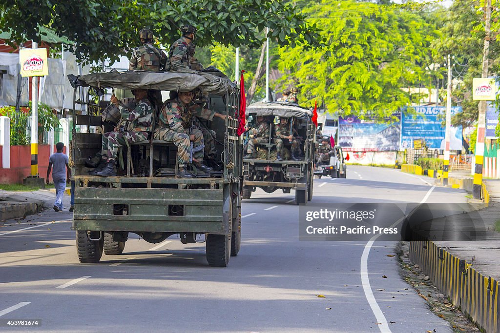 Army personnel carry out a patrol while roving during the...