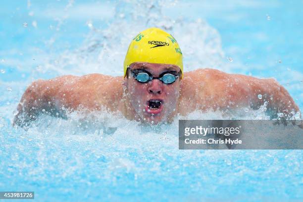Ned McKendry of Australia swims the Men's 100m Butterfly heats during day three of the 2014 Pan Pacific Championships at Gold Coast Aquatics on...