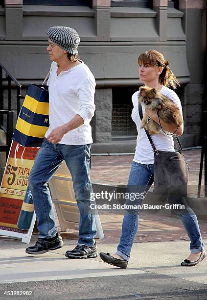 Eddie Van Halen and his wife, Janie Liszewski are seen on March 12, 2012 in Boston, Massachusetts.