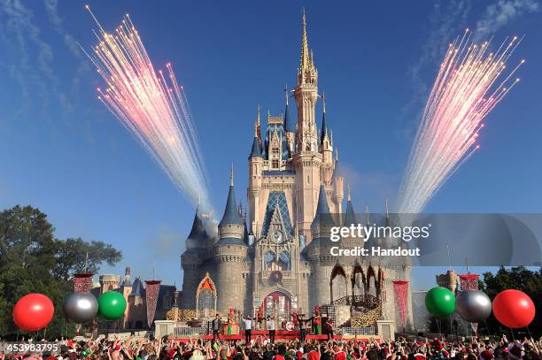 In this handout photo provided by Disney Parks, English-Irish boy band The Wanted performs "Santa Claus is Coming To Town" while taping the Disney...