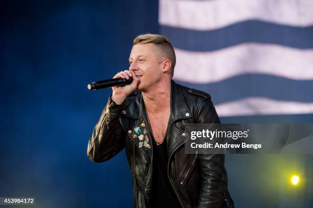 Macklemore of Macklemore & Ryan Lewis performs on stage at Leeds Festival at Bramham Park on August 22, 2014 in Leeds, United Kingdom.