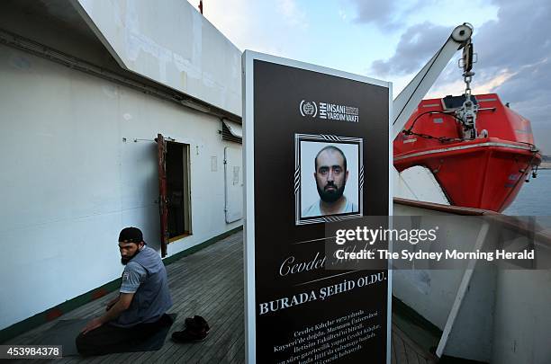 Man prays on the deck of the Turkish ship, MV Mavi Marmara, which is docked in the Port of Istanbul, Turkey, on the fourth anniversary of the Gaza...