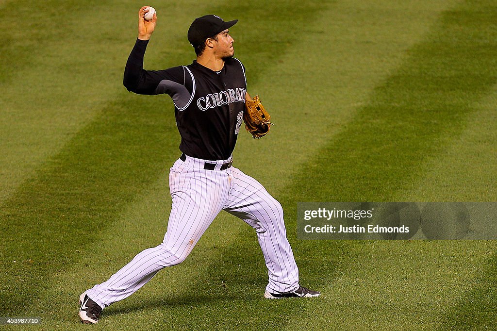 Miami Marlins v Colorado Rockies