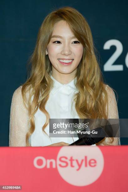 Taeyeon of South Korean girl group Girls' Generation attends the press conference for OnStyle "The TaeTiSeo" at CJ E&M Center on August 22, 2014 in...