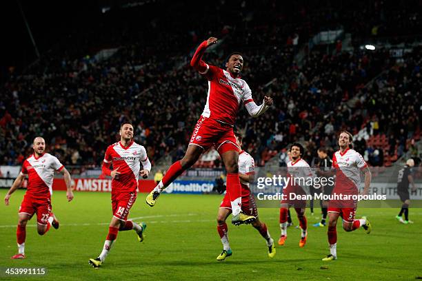 Gevero Markiet of Utrecht leaps in celebration after scoring the first goal of the game during the Dutch Eredivisie match between FC Utrecht and NEC...