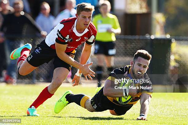 Zack Holmes of the Spirit scores a try during the round one National Rugby Championship match between the Canberra Vikings and Perth Spirit at Viking...