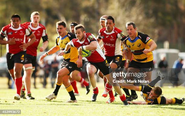 Robbie Coleman of the Vikings makes a line break to score during the round one National Rugby Championship match between the Canberra Vikings and...