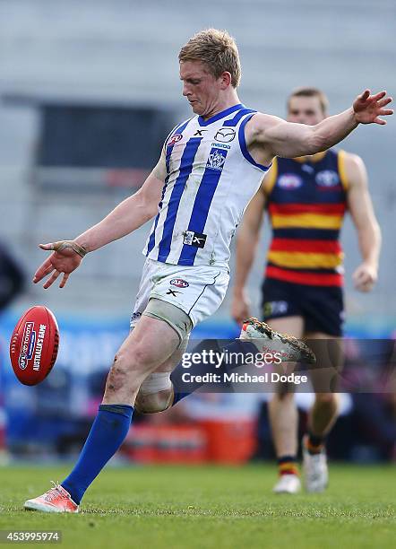 Jack Ziebell of the Kangaroos kicks the ball for a goal during the round 22 AFL match between the North Melbourne Kangaroos and the Adelaide Crows at...