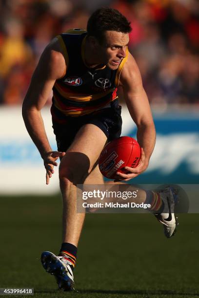 Brodie Smith of the Crows looks upfield during the round 22 AFL match between the North Melbourne Kangaroos and the Adelaide Crows at Blundstone...