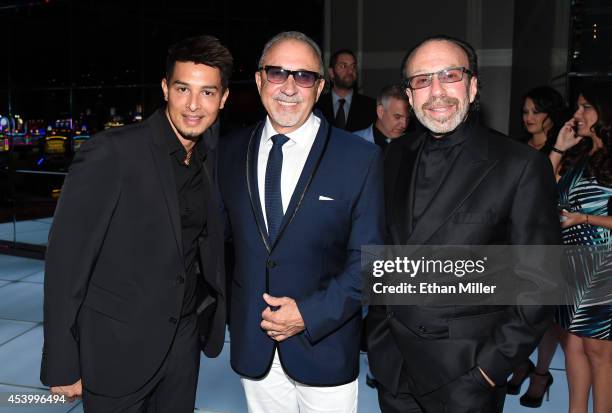 Cirque du Soleil's Jamie King, producer and musician Emilio Estefan Jr. And entertainment manager Bernie Yuman attend the SLS Las Vegas grand opening...