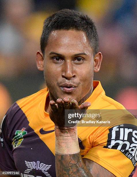 Ben Barba of the Broncos celebrates a try during the round 24 NRL match between the Brisbane Broncos and the Newcastle Knights at Suncorp Stadium on...
