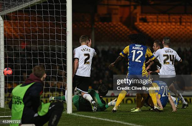 Dan Fithcett of Salisbury City scores his teams first goal and the equaliser during the FA Cup Second Round match between Port Vale and Salisbury...