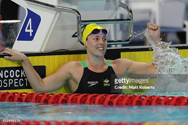 Alicia Coutts of Australia celebrates winning the Women's 100m Butterfly Final during day three of the 2014 Pan Pacific Championships at Gold Coast...