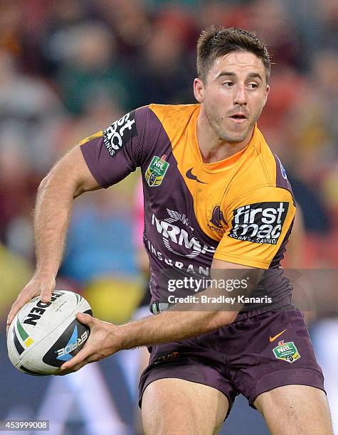 Ben Hunt of the Broncos looks to pass during the round 24 NRL match between the Brisbane Broncos and the Newcastle Knights at Suncorp Stadium on...