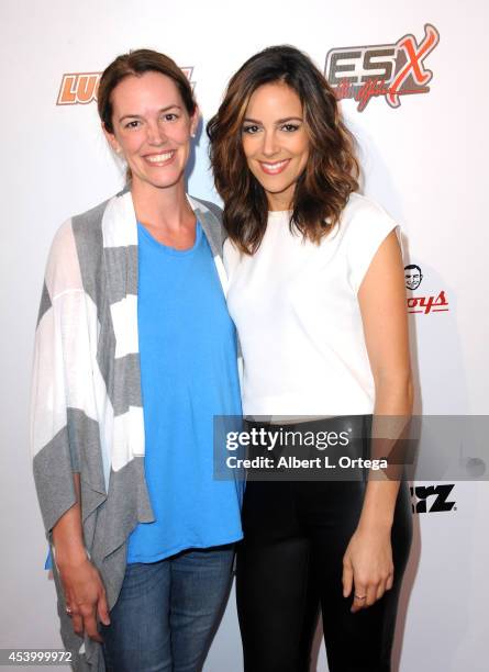 Anchor Bay's Erin Carter and actress Tiffany Dupont at the Special Outdoor Screening Of "Born To Race: Fast Track" held at Pep Boys on August 22,...