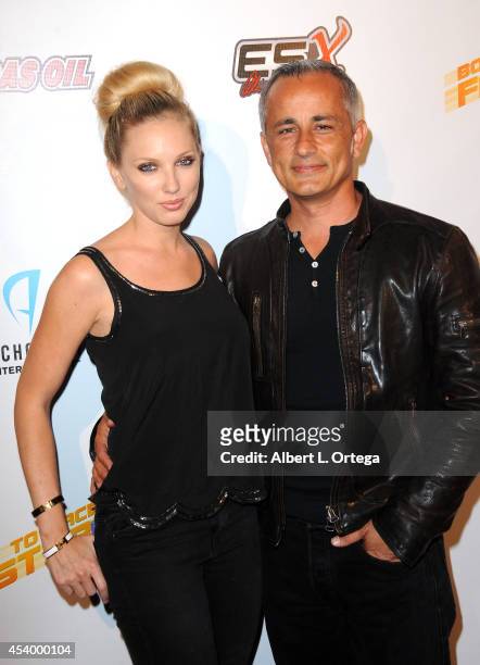 Model Ashley Michaelsen and producer Ali Afshar at the Special Outdoor Screening Of "Born To Race: Fast Track" held at Pep Boys on August 22, 2014 in...