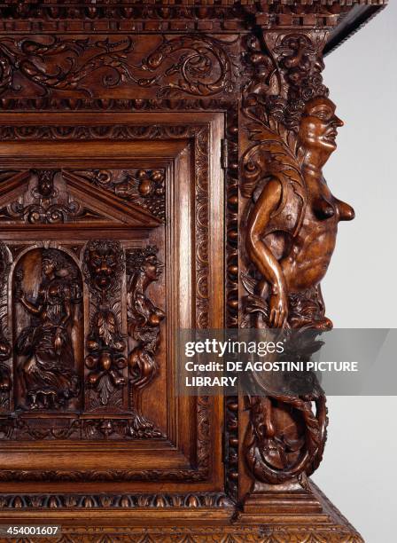 Walnut dressoir decorated with carved grotesque figures Renaissance style with a drawing attributed to Hugues Sambin . France, 16th century. Detail....