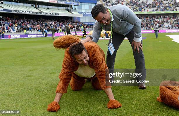 Former England captain Michael Vaughan is interviewed by David Lloyd as he takes part in the mascot race during Natwest T20 finals day at Edgbaston...