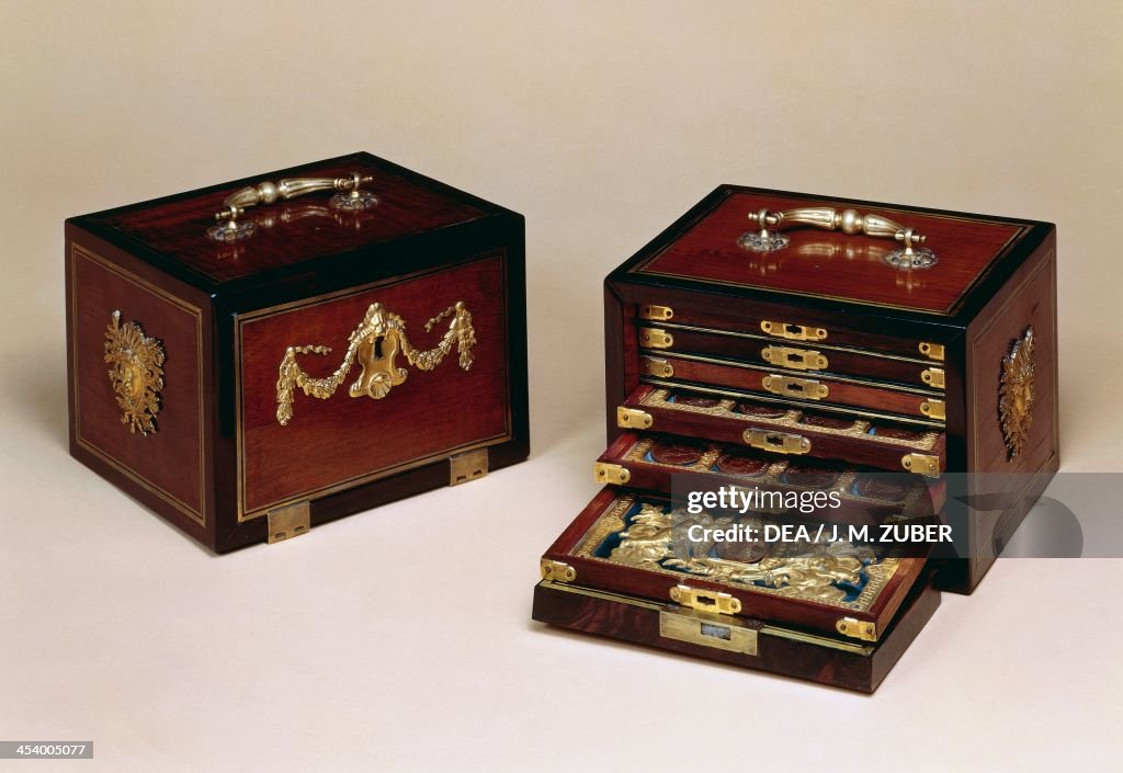 Pair of Louis XIV style coin cabinets